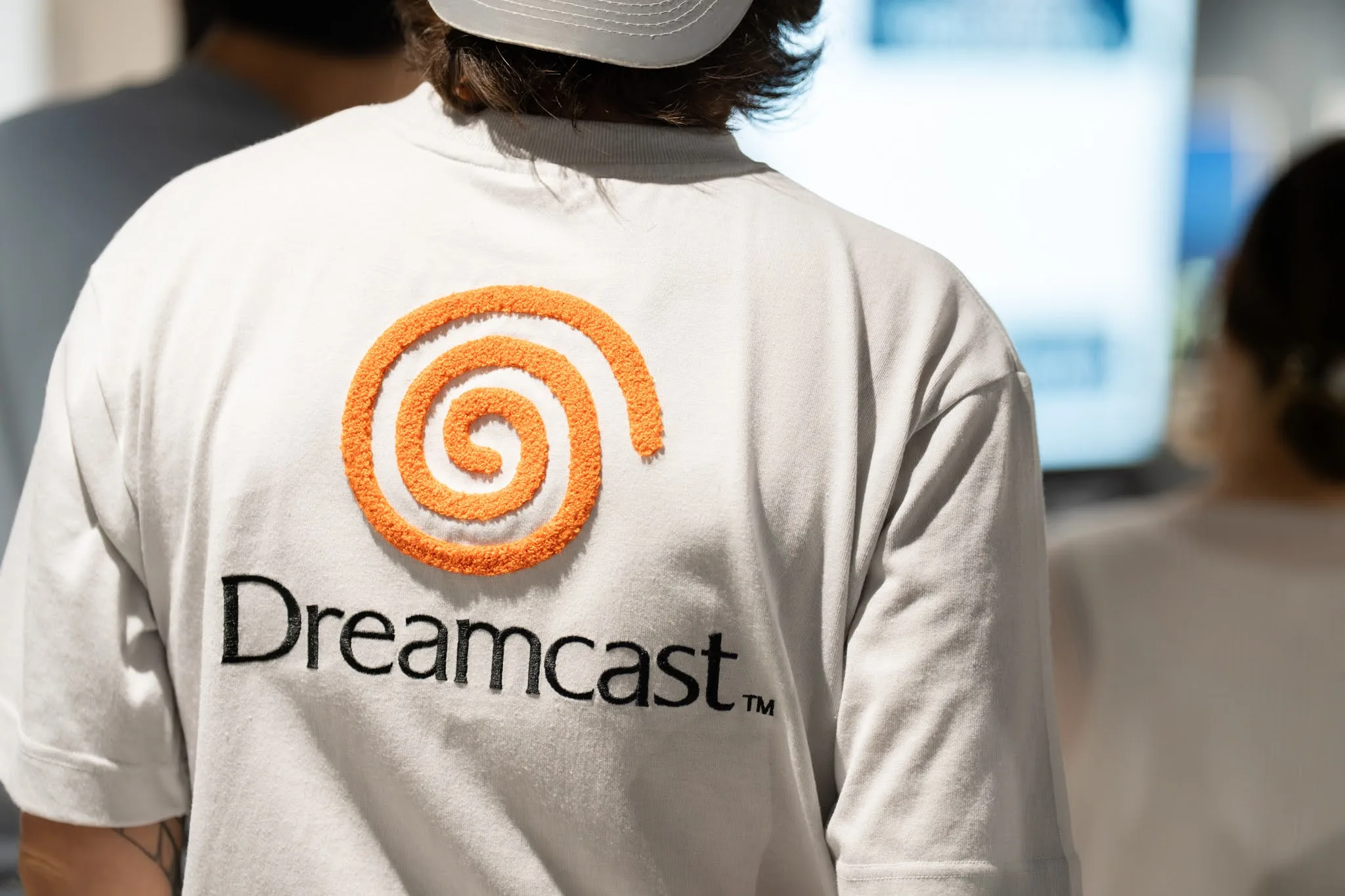 Back of a white t-shirt with the Dreamcast logo